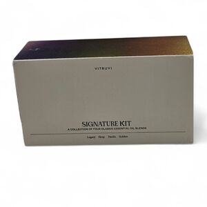 Vitruvi Signature Essential Oil Kit containing four distinct botanical blends